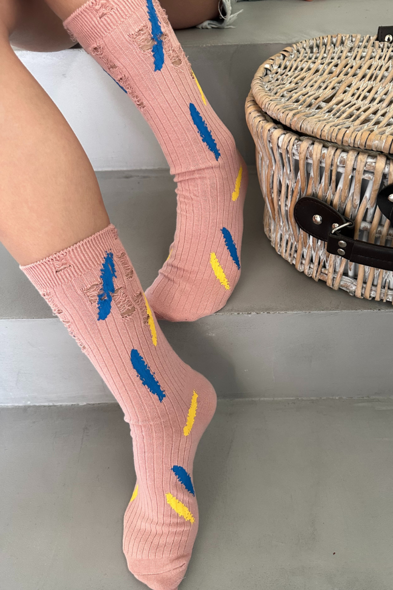 Designed torn socks