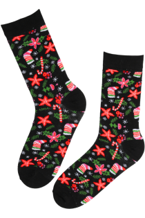 Black cotton socks adorned with Christmas-themed patterns such as snowfall, snowflakes, gifts, and other festive elements.